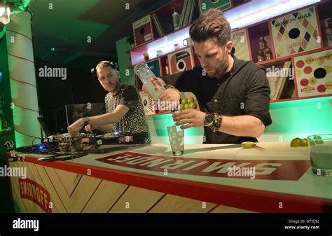 Mr Hudson (left) and the Smirnoff barman unveil 10 most popular mixed drinks as music tracks at ...