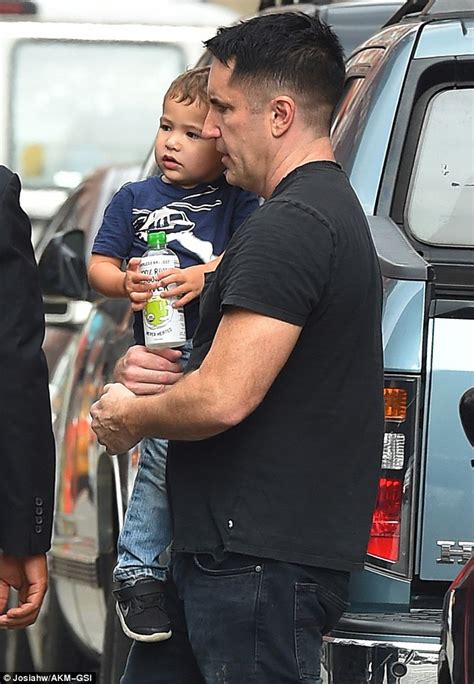 Trent Reznor shows his soft side as he dotes on his sons during family day out | Daily Mail Online