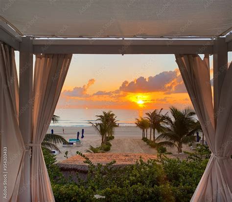 Poster perfect Sunrise in Cancun, Mexico. Cancun is the tropical paradise with sun and golden ...