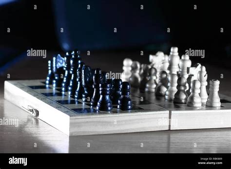 chess composition on dark background. strategy concept Stock Photo - Alamy