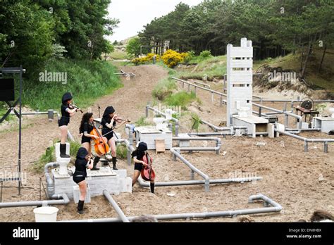 An outdoor theatrical performance at Oerol Festival Terschelling Island ...