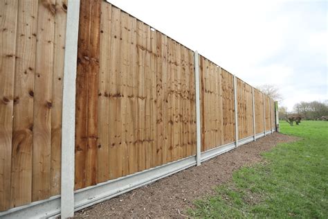 How to install concrete slotted fence posts and gravel boards - Allen Concrete