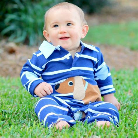 How dog gone cute?! Our long sleeve dog applique romper is a staple for your little boys ...