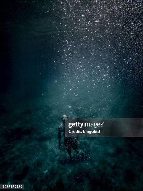 Person Breathing Underwater Photos and Premium High Res Pictures - Getty Images