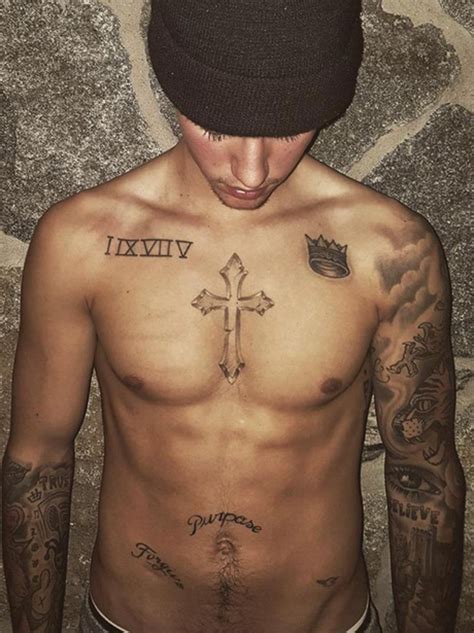 2015: Check out the latest tattoo! Justin Bieber shows off his 'Purpose' tattoo on... - Capital