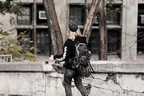 Free Images : man, walking, road, street, skateboard, backpack, city, urban, statue, young ...