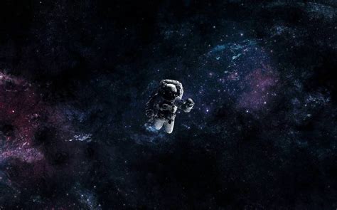 Astronaut floating in space. | Astronaut wallpaper, Outer space ...