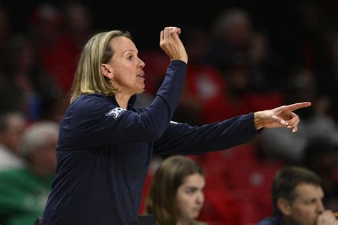 Minnesota hires West Virginia's Plitzuweit to replace Whalen | AP News