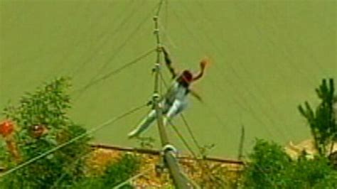 Chinese Tightrope Walker Falls Off Wire Video - ABC News