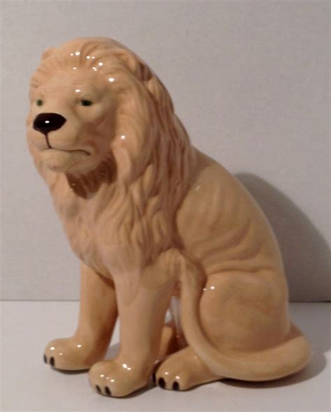 Ceramic Sitting Lion Figurine