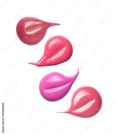 Different lip gloss swatches isolated on white Stock Photo | Adobe Stock