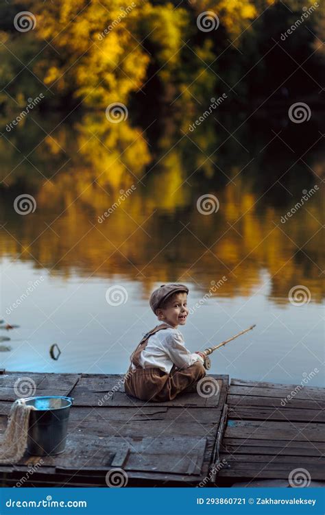 Little Boy Fishing at Sunset Stock Image - Image of enjoyment, nature ...