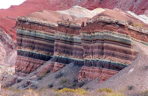 some very colorful rock formations in the desert