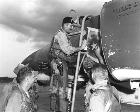 Col. Robin Olds painting a victory star on the McDonnell F… | Flickr