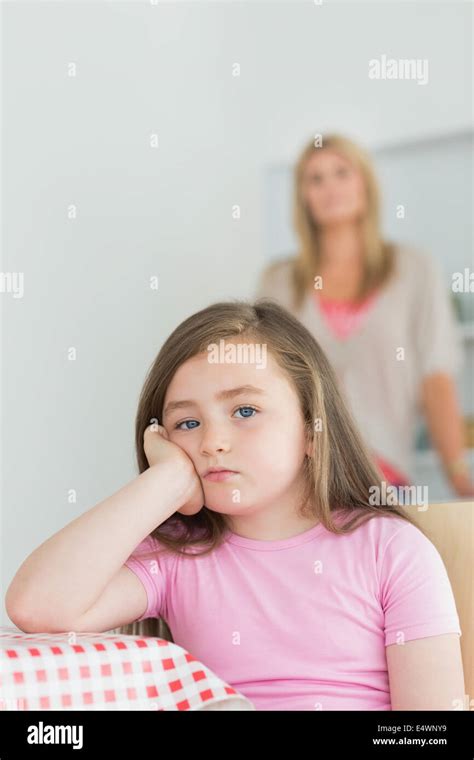 Little girl looking annoyed Stock Photo - Alamy