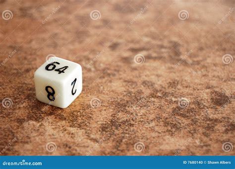 Sixty-four Sided Dice On Tile Stock Photo - Image: 7680140