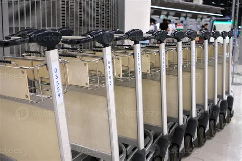 Luggage Trolley Cart in the Airport. 19937395 Stock Photo at Vecteezy