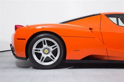 One-Off Rosso Dino Orange Ferrari Enzo Costs $3.7 Million - carscoops.com