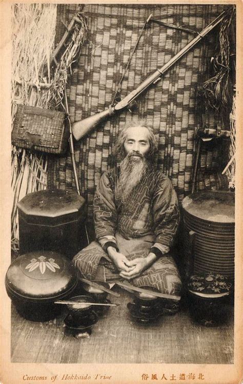 Ainu man with his tools and weapon from "The Customs of Hokkaido tribe" series, ca. 1910 Edo ...