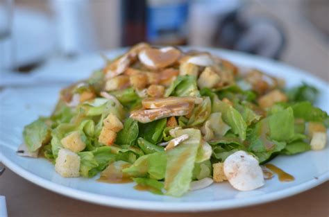 A Woman Eating a Salad · Free Stock Photo