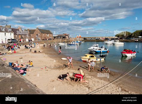 Sandy beach in Stonehaven harbour, Aberdeenshire, Scotland Stock Photo ...