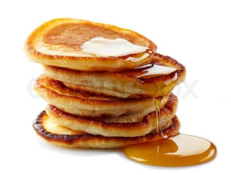 Pancakes with maple syrup on white ... | Stock image | Colourbox