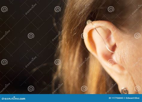 Deaf woman hearing aid ear stock image. Image of audiology - 117756843