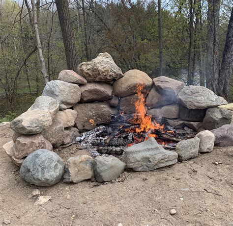 Rock Boulder fire pit | Fire pit landscaping, Natural fire pit, Fire pit backyard