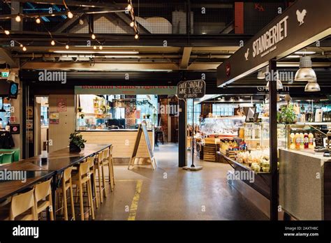 Oslo, Norway - August 11, 2019: View of Mathallen Oslo, a food market in Grunerlokka, with cafes ...