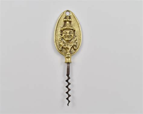 An English cast brass single sided corkscrew with a depiction of Mr Punch. – The Old Corkscrew ...