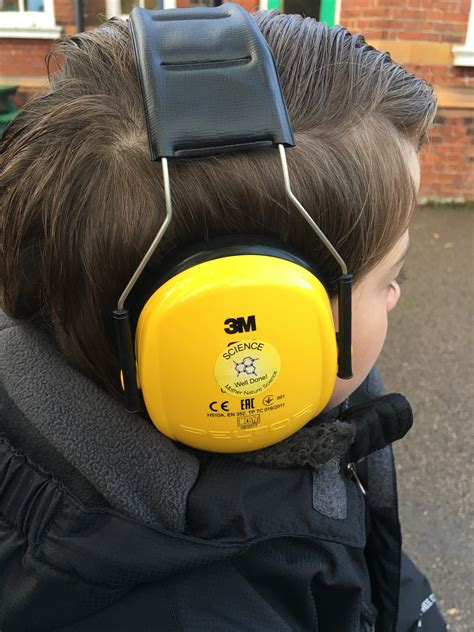 The Story Behind the Photo of My Autistic Son Wearing Ear Defenders