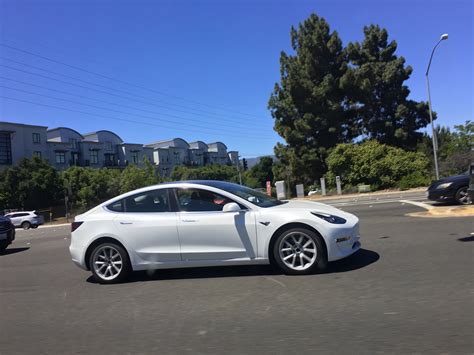 New close encounter spy shots of the White Tesla Model 3