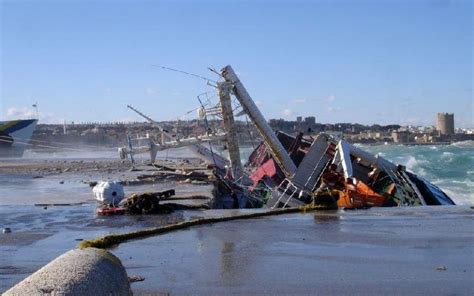 Watch: Cargo Ship Sinks In Port Due To Strong Winds