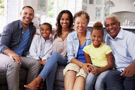 Group portrait of multi generation black family at home - Stock Photo - Dissolve