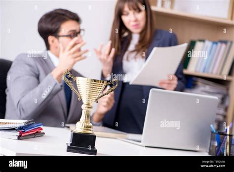 Concept of teamwork with prize Stock Photo - Alamy