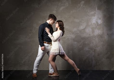 Beautiful couple in the active ballroom dance Stock Photo | Adobe Stock