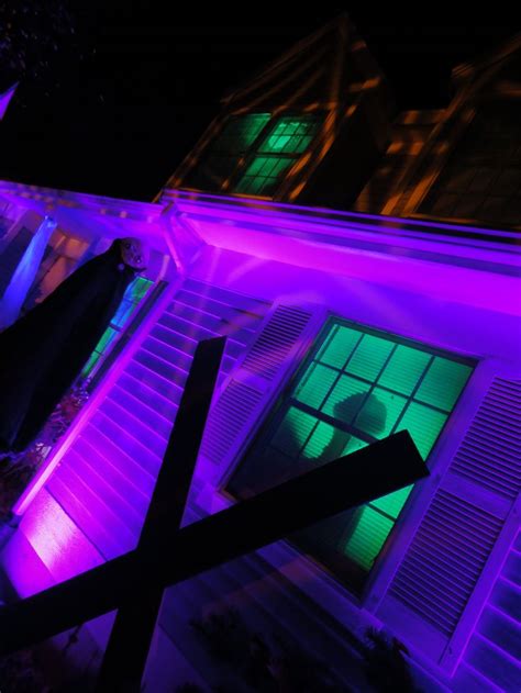 Alien in window | Halloween lights, Event lighting, Halloween event