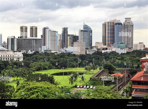 Manila city skyline in Philippines. Ermita and Paco districts seen from Intramuros Stock Photo ...