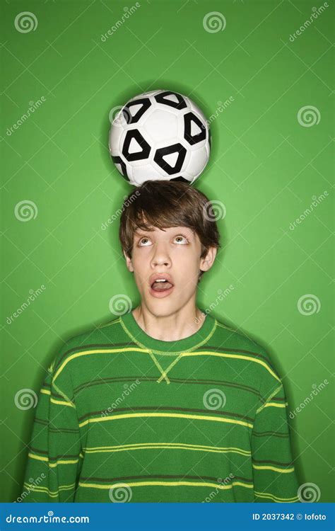 Caucasian Teen Boy With Soccer Ball On Head. Stock Photo - Image of space, teen: 2037342