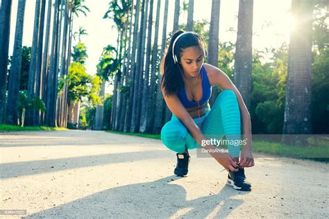 Tying Shoelaces And Preparing For Workout High-Res Stock Photo - Getty Images