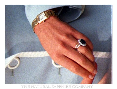 Beneath Princess Diana's sapphire engagement ring is her gold wedding ...