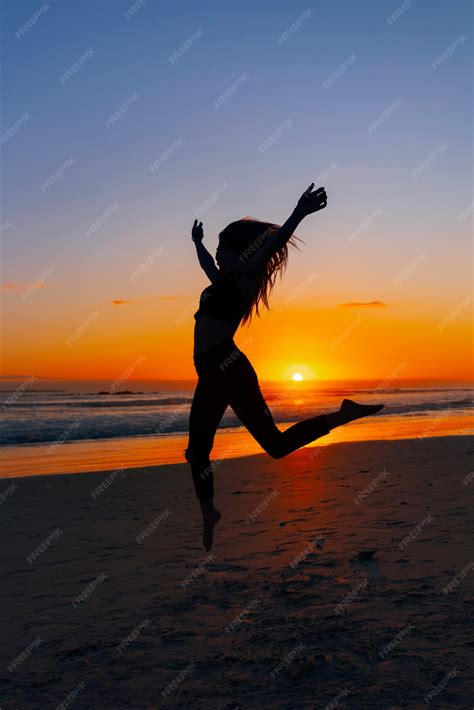 Premium Photo | Full shot silhouette jumping at sunset