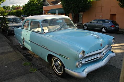 OLD PARKED CARS.: 1952 Ford Customline.