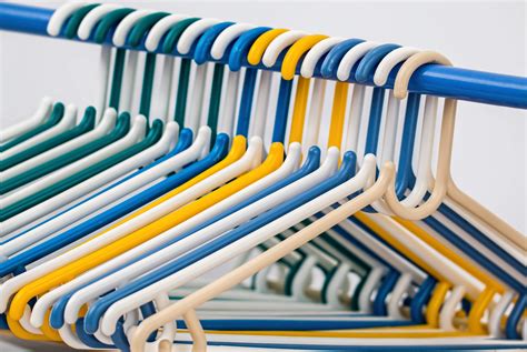Pile of Shirts Hanged in Shirt Rack · Free Stock Photo