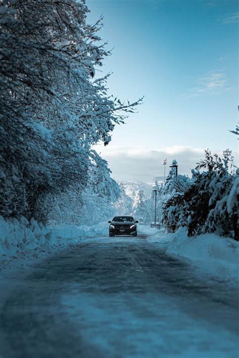 Black suv on snow covered road during daytime photo – Free Switzerland ...