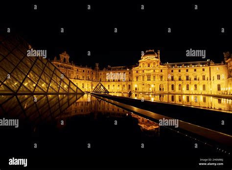 The Louvre Palace and Museum At Night Paris, France Stock Photo - Alamy