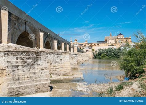 Roman Bridge Over Guadalquivir River Editorial Photography - Image of ...