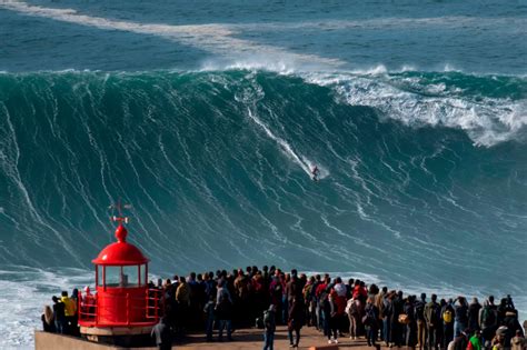 Catching big waves at Nazaré - in pictures | Big wave surfing, Surfing, Big waves