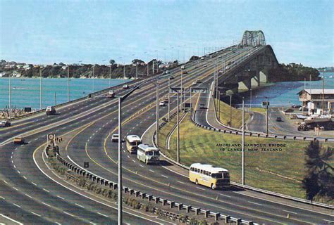 transpress nz: buses drive off the Auckland Harbour Bridge, late 1960s