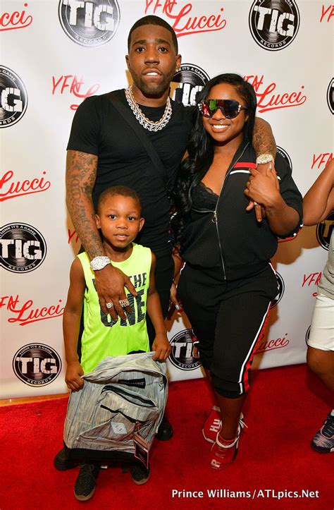 Reginae Carter and YFN Lucci pose with his son at their back-to-school ...